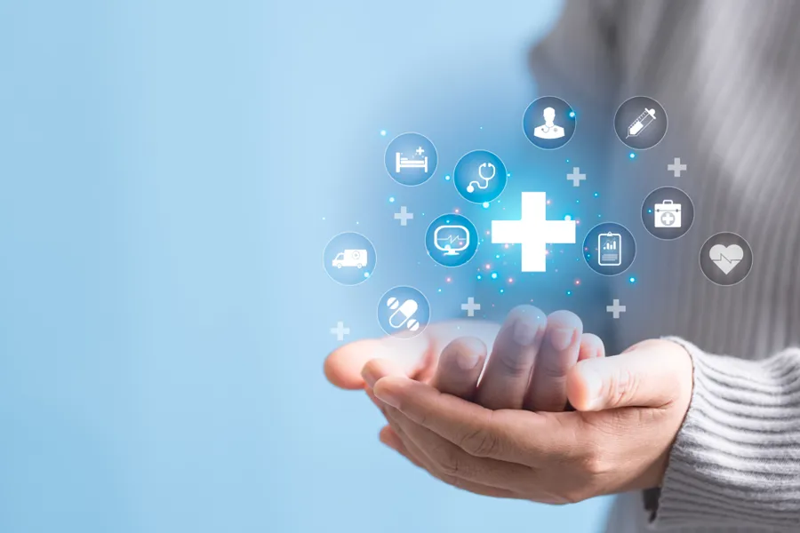 To hender og flere rundinger som med symboler om helse inni