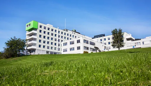 A building with a lawn in front of it